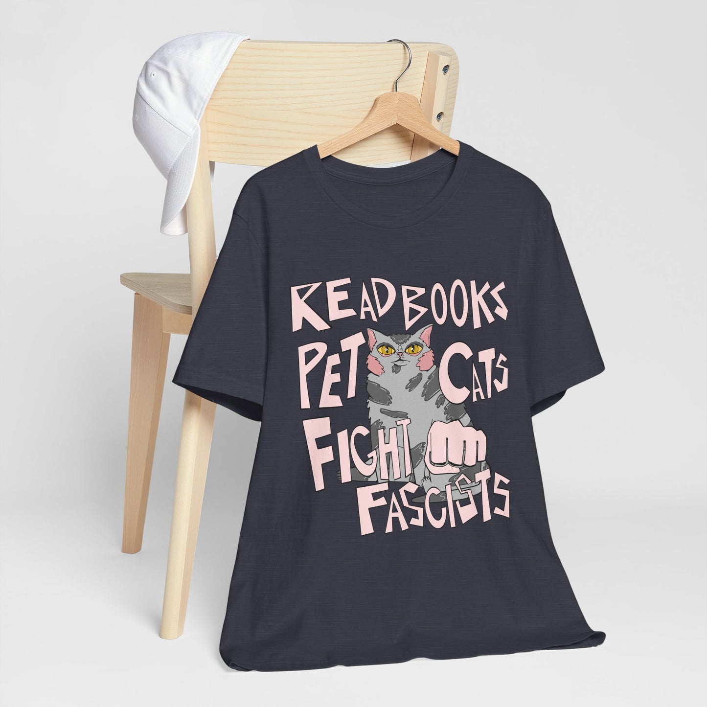 Read Books Pet Cats Fight Fascists- Grey Tabby Cat Unisex Jersey Short Sleeve Tee