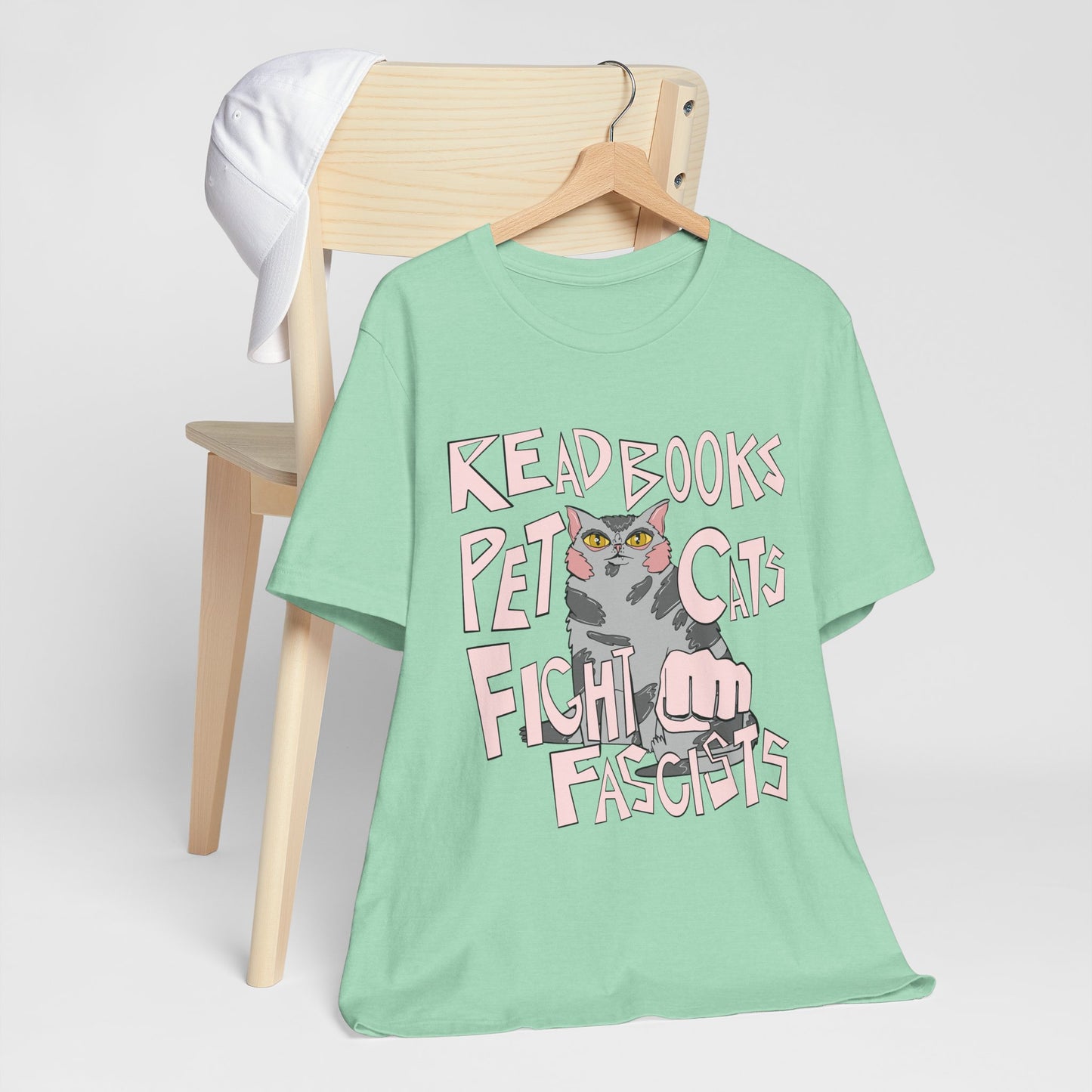 Read Books Pet Cats Fight Fascists- Grey Tabby Cat Unisex Jersey Short Sleeve Tee