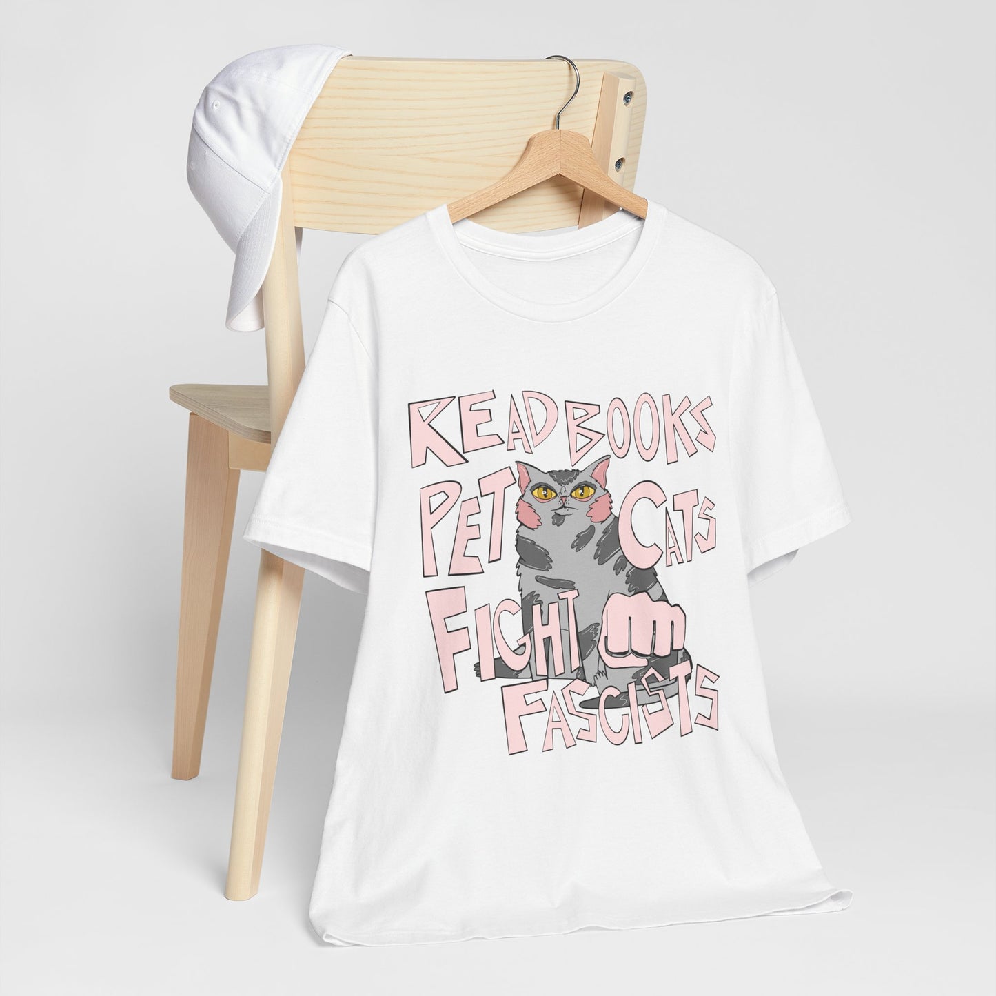 Read Books Pet Cats Fight Fascists- Grey Tabby Cat Unisex Jersey Short Sleeve Tee